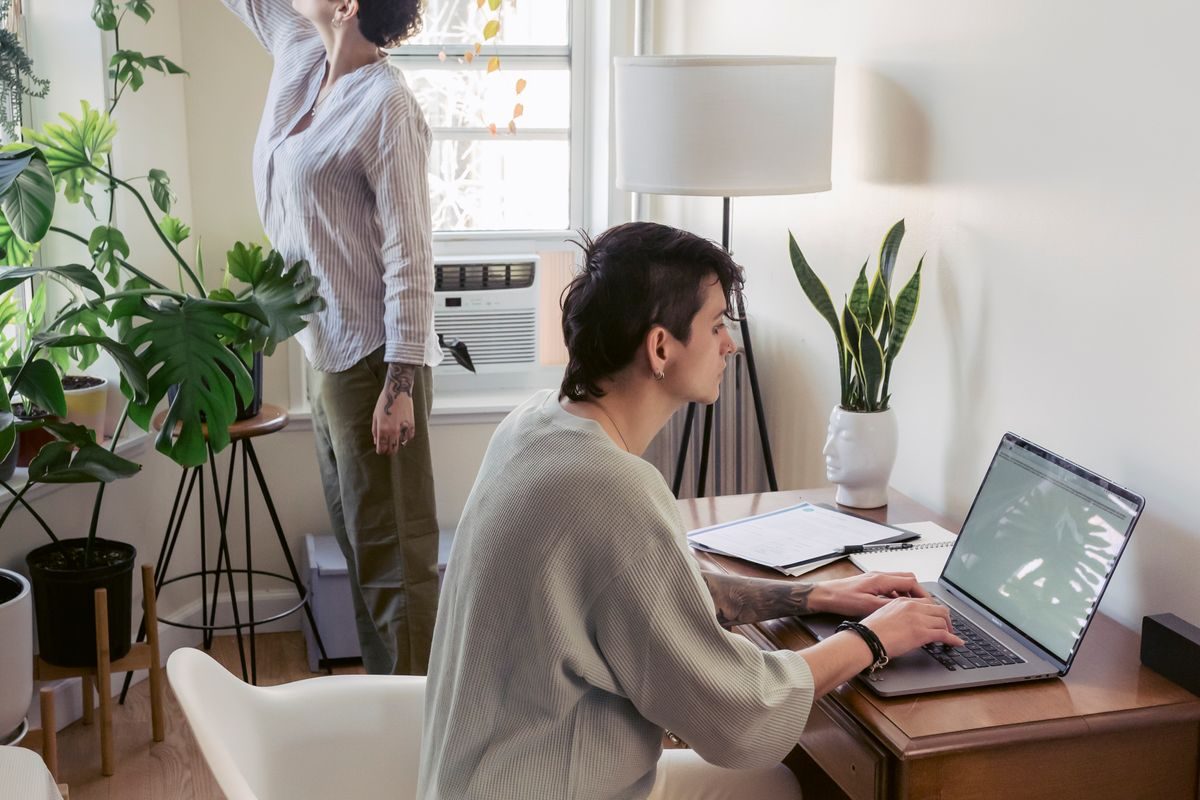 Colleagues working at a shared desk